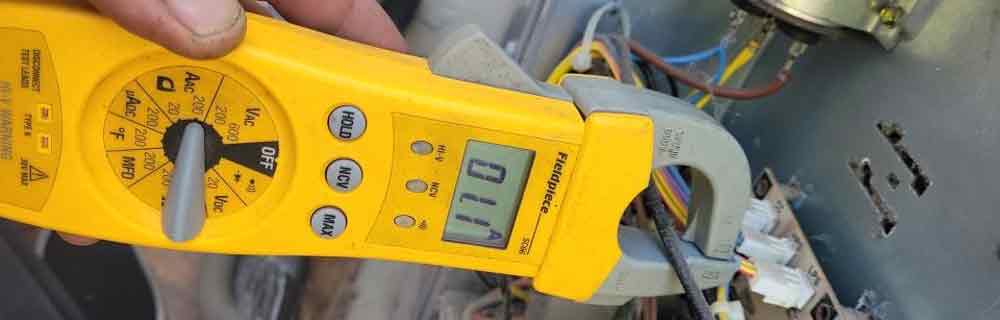 troubleshooting voltage issues for ac repair with yellow voltage multimeter